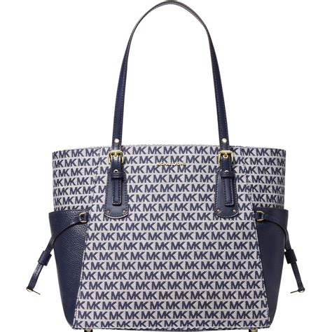 michael kors voyager east west tote with studs|Michael Kors Tote with zipper.